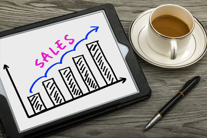 sales graph hand drawing on tablet pc